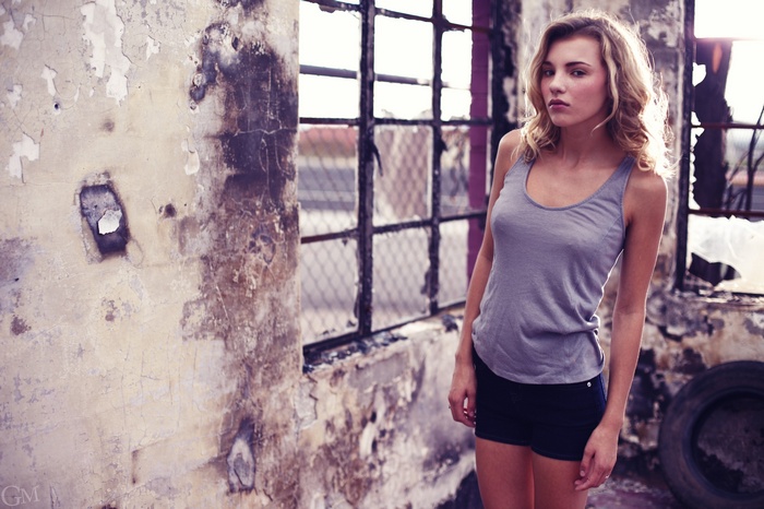 Rachel Ann Yampolsky in a tank top and shorts