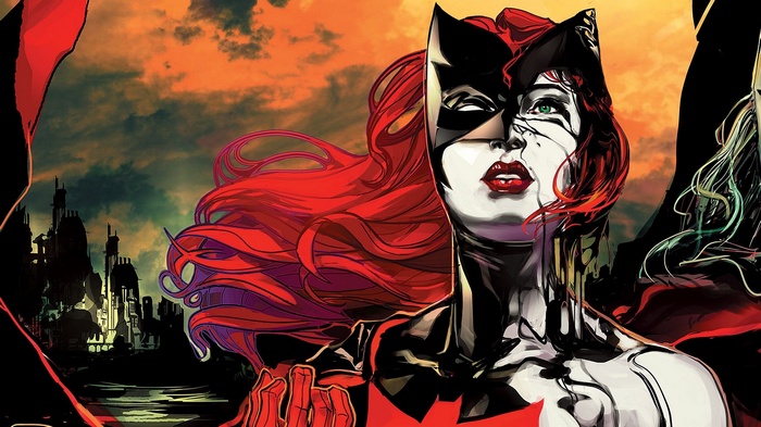 Batwoman in front of a dark city skyline