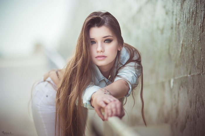 Arina Kortchov with long auburn hair