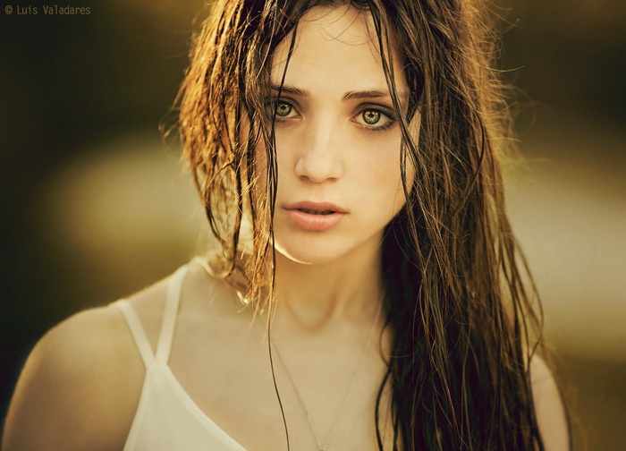Portrait of a young woman with wet hair