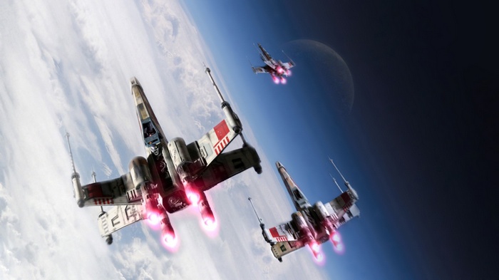 Star Wars X-wings flying over a planet