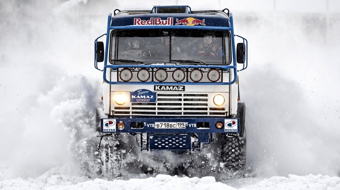Kamaz truck driving through snow