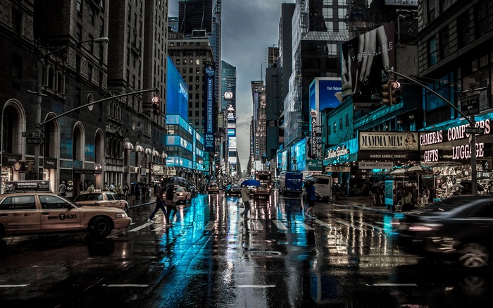 Rainy New York City Street with Yellow Taxis