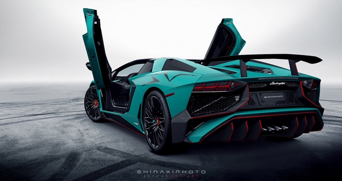 Teal Lamborghini Aventador with Scissor Doors Open