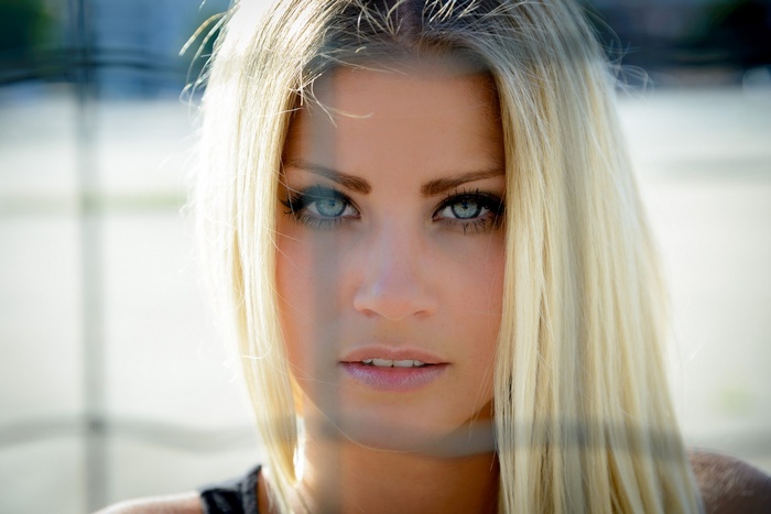 Portrait of a blonde woman with blue eyes