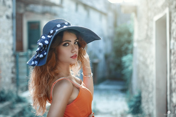 Clara Alonso wearing a blue polka dot hat