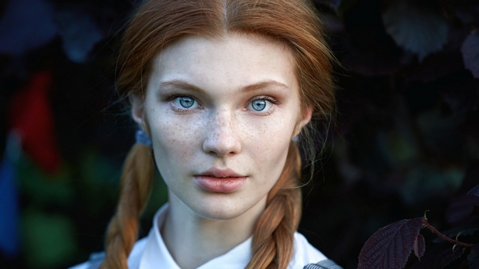 Dasha Milko with red hair and blue eyes