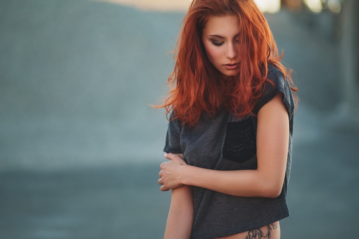 Victoria Ryzhevolosaya with red hair in a portrait