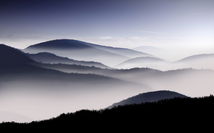 Misty mountains landscape silhouette