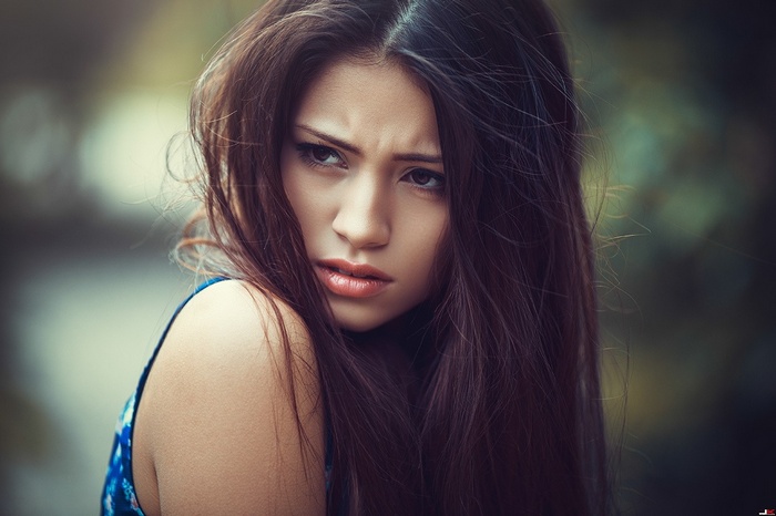 Portrait of a young woman with dark hair