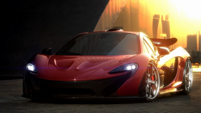 Red McLaren P1 sports car in golden hour light