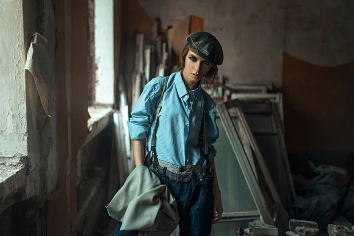 Viktoria Vishnevetskaya in a blue striped shirt and suspenders