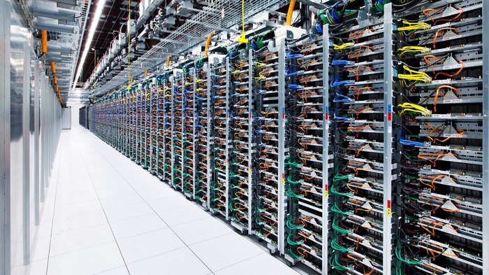 Google data center with rows of servers and cables