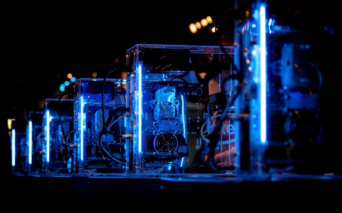 Computer CPUs with blue LED lights in a data center