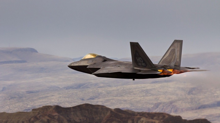 F-22 Raptor flying with afterburner