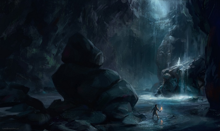 Man with torch explores a dark cave with waterfall