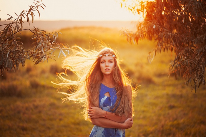 Ann Nevreva with long blonde hair in the wind