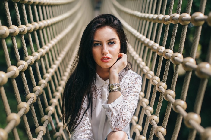 Aurela Skandaj on a rope bridge