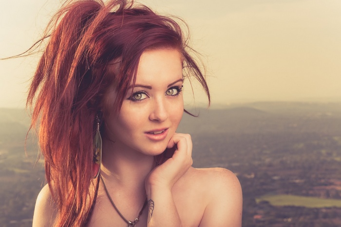 Portrait of a redhead woman with long hair