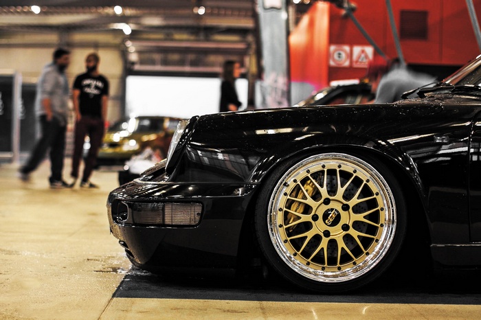 Black Porsche 911 with gold BBS wheels