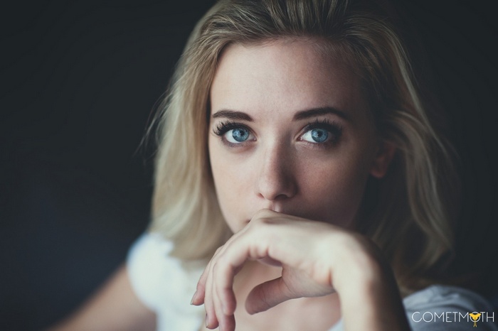Woman with blue eyes and blonde hair