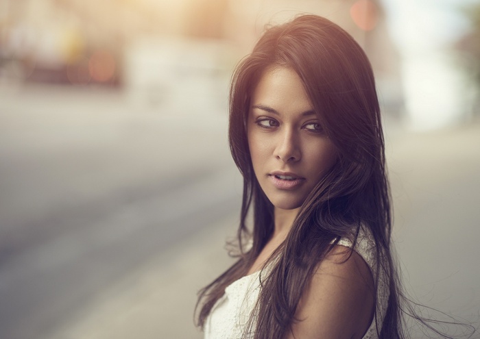 Portrait of a young woman with dark hair