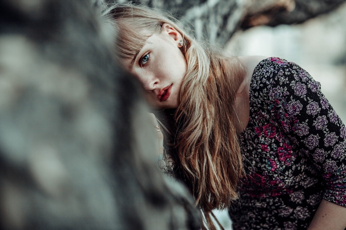 Woman with blonde hair and blue eyes