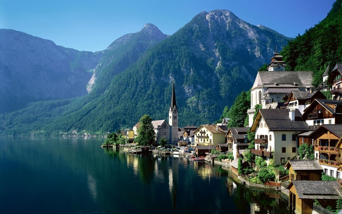 Hallstatt village on a lake with mountains in Austria