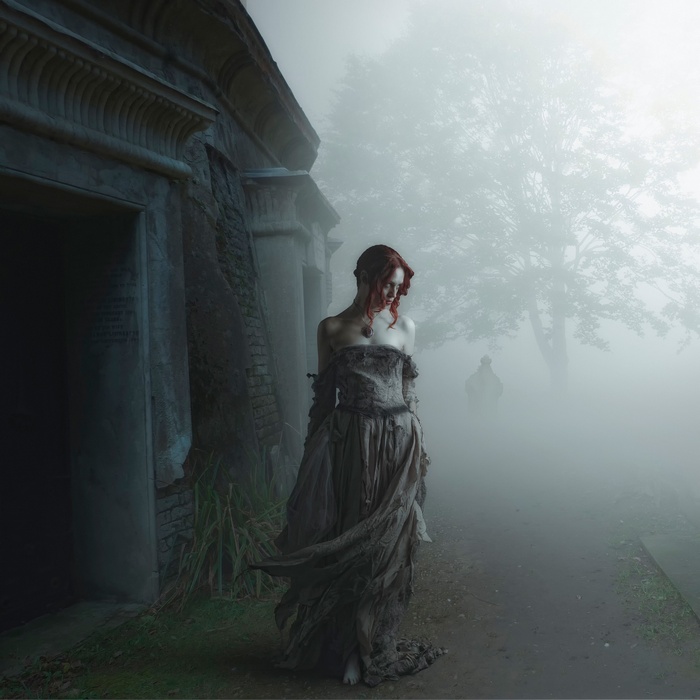 Gothic fantasy art of a redhead in a graveyard