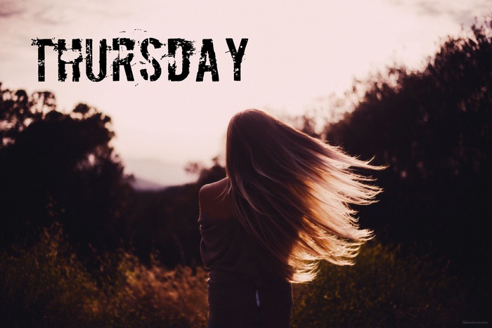 Thursday text over a woman with windblown hair
