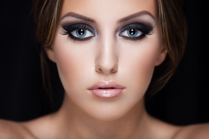 Portrait of a woman with dramatic makeup