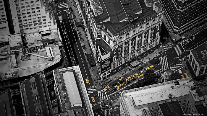 New York City street with yellow taxis and buildings