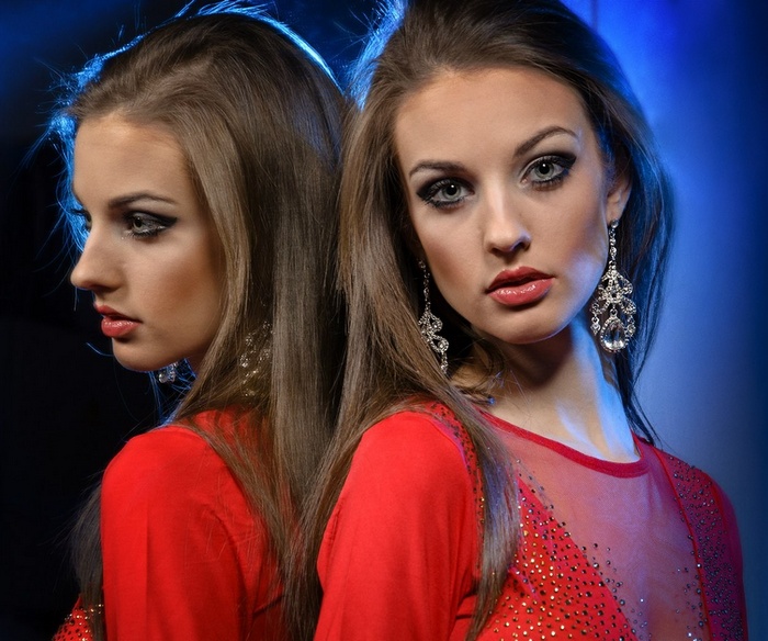 Alla Berger in a red dress with earrings