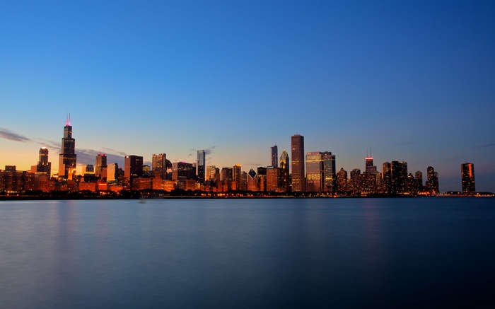Chicago skyline at dusk over Lake Michigan