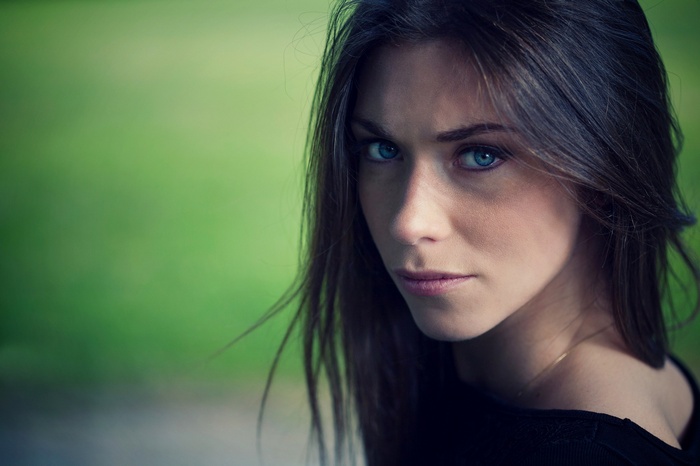 Portrait of a young woman with blue eyes