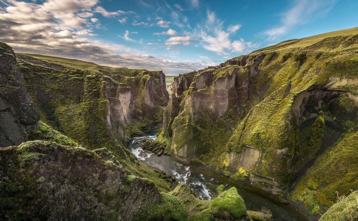 Moss-covered canyon with a river in Iceland