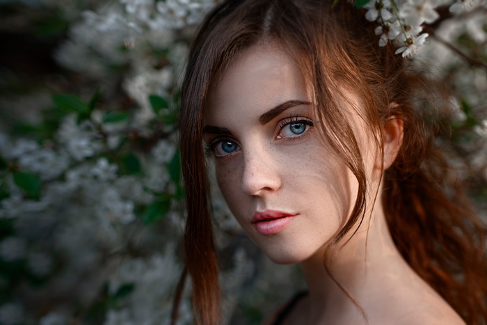 Portrait of a redhead woman with blue eyes