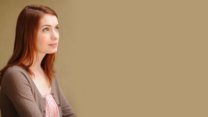 Felicia Day looking up with a smile