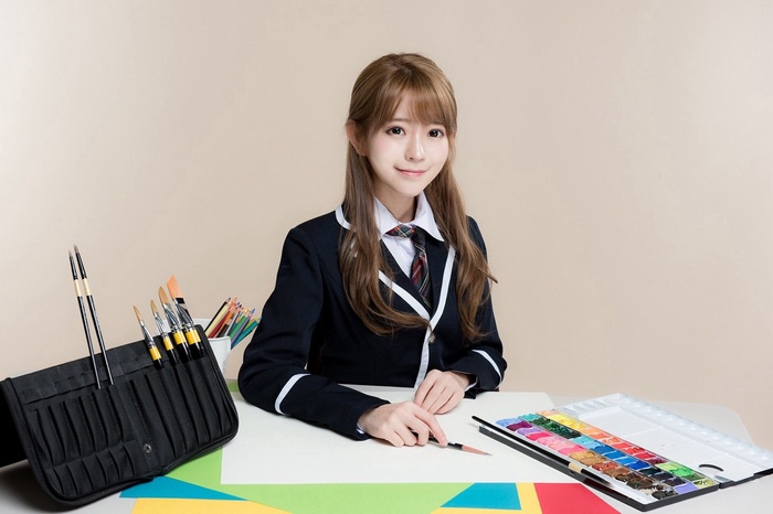 Yurisa Chan in a school uniform with art supplies