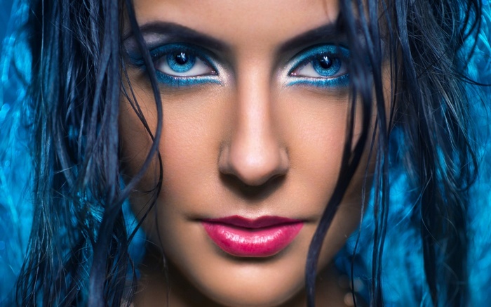 Portrait of a woman with blue eyes and makeup