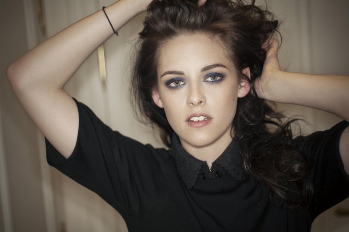 Kristen Stewart with dark hair and makeup