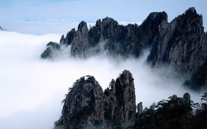 Huangshan Mountains shrouded in clouds, China