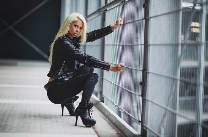 Angela Kutscher in black leather jacket and jeans