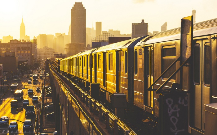 Elevated Train in New York City at Sunset