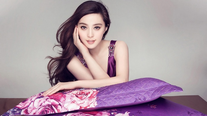 Fan Bingbing Poses with Floral Pillows