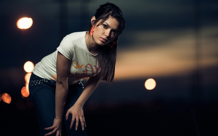 Jennifer Lamiraqui posing with lights in the background