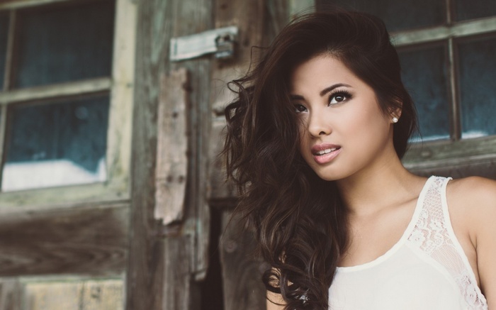 Woman with long wavy brown hair