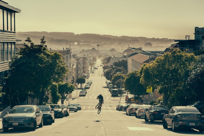 Cyclist jumps on a steep San Francisco street