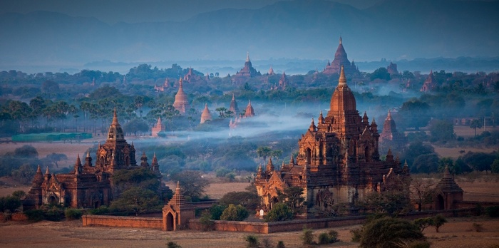 Misty morning over ancient Buddhist temples in Bagan, Myanmar