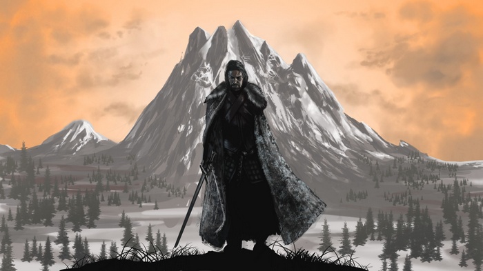 Jon Snow in front of snowy mountains